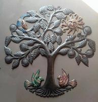 Metal tree of life with sun and moon